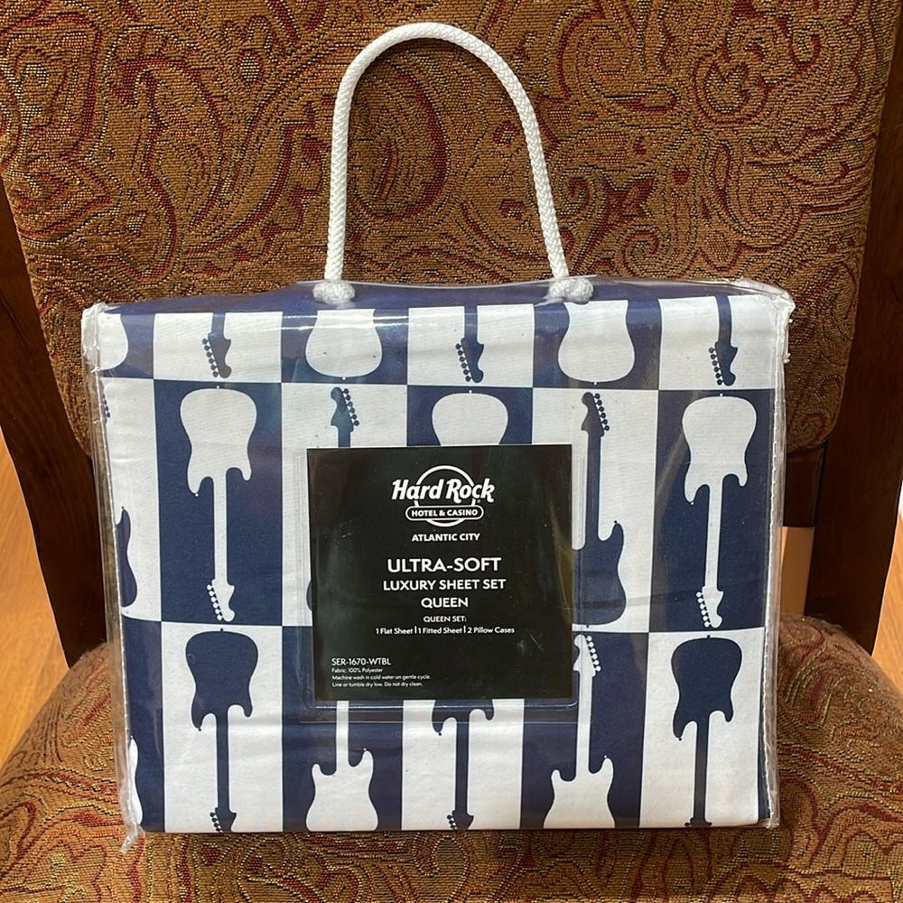 The Hard Rock Queen size, navy blue and white checkered guitar sheets.